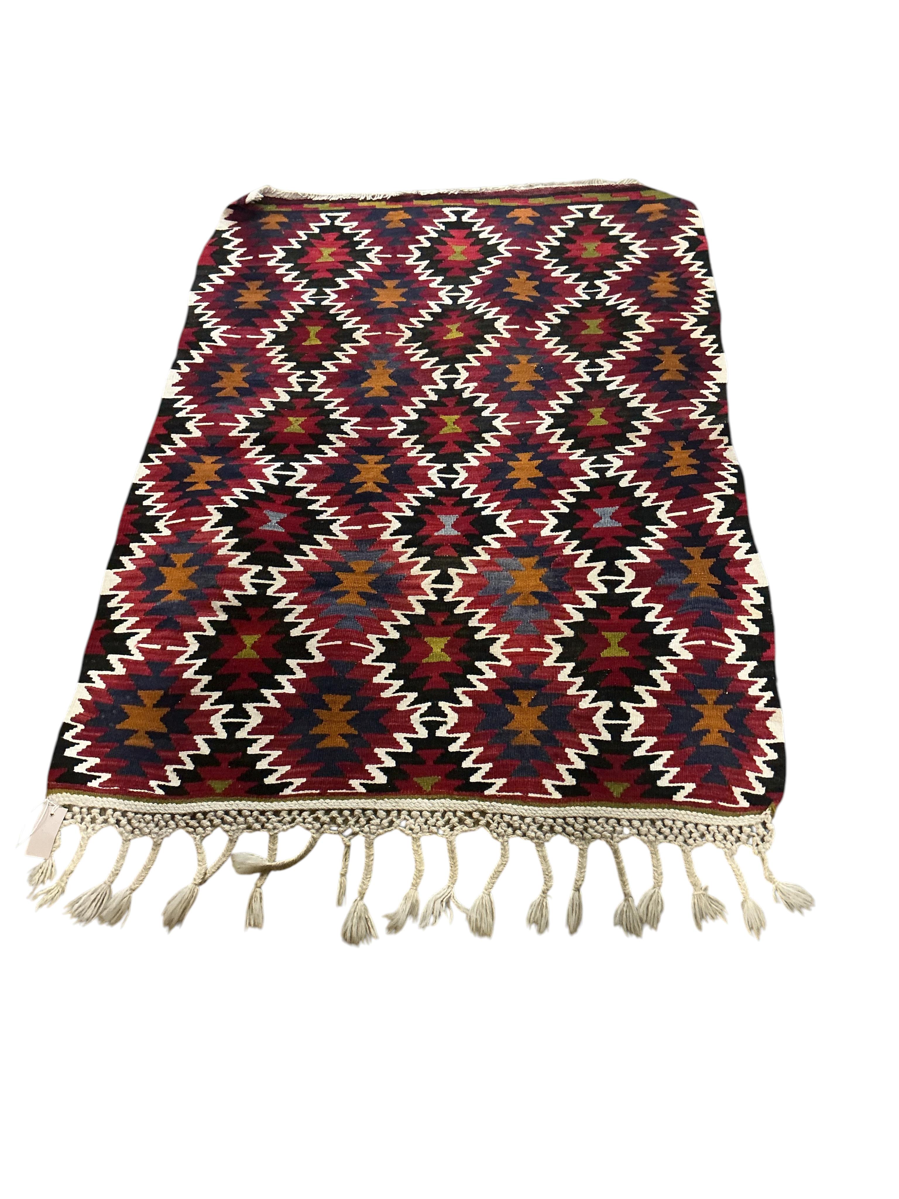 A Kilim polychrome flatweave rug, 130 x 100cm